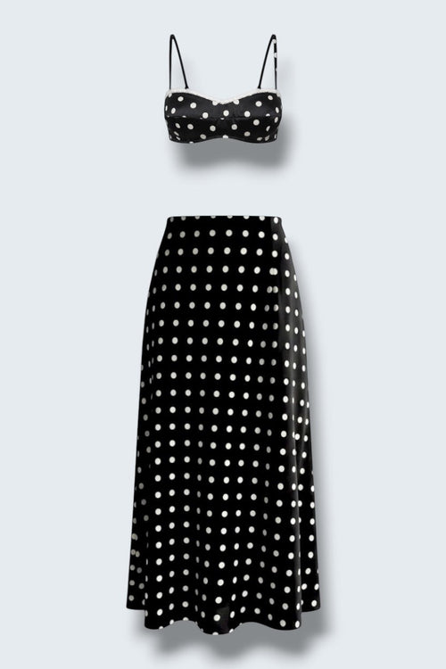The Saint 54 Dolce Vita N3 two-piece set featuring a black polka dot crop top with lace trim and matching midi skirt.